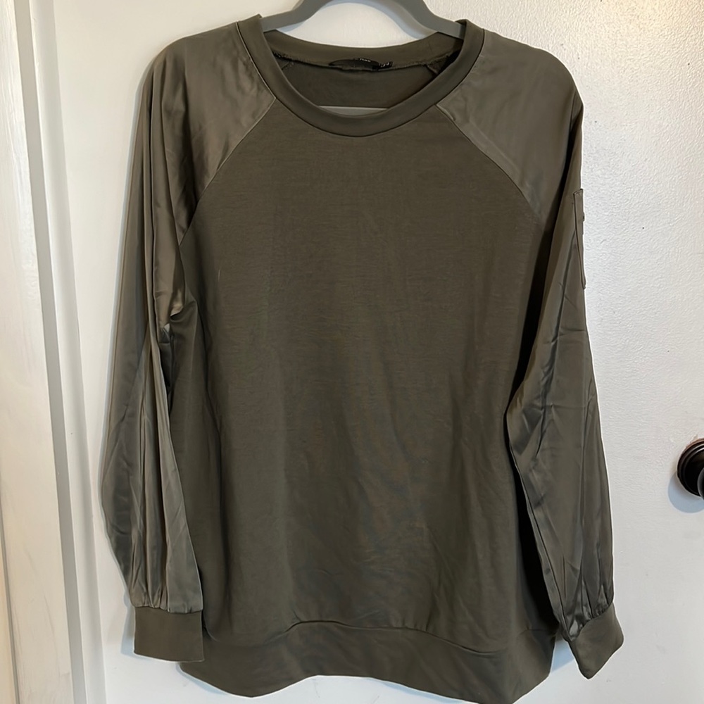 Hunter green bomber style long-sleeved T. NWT. Size medium.